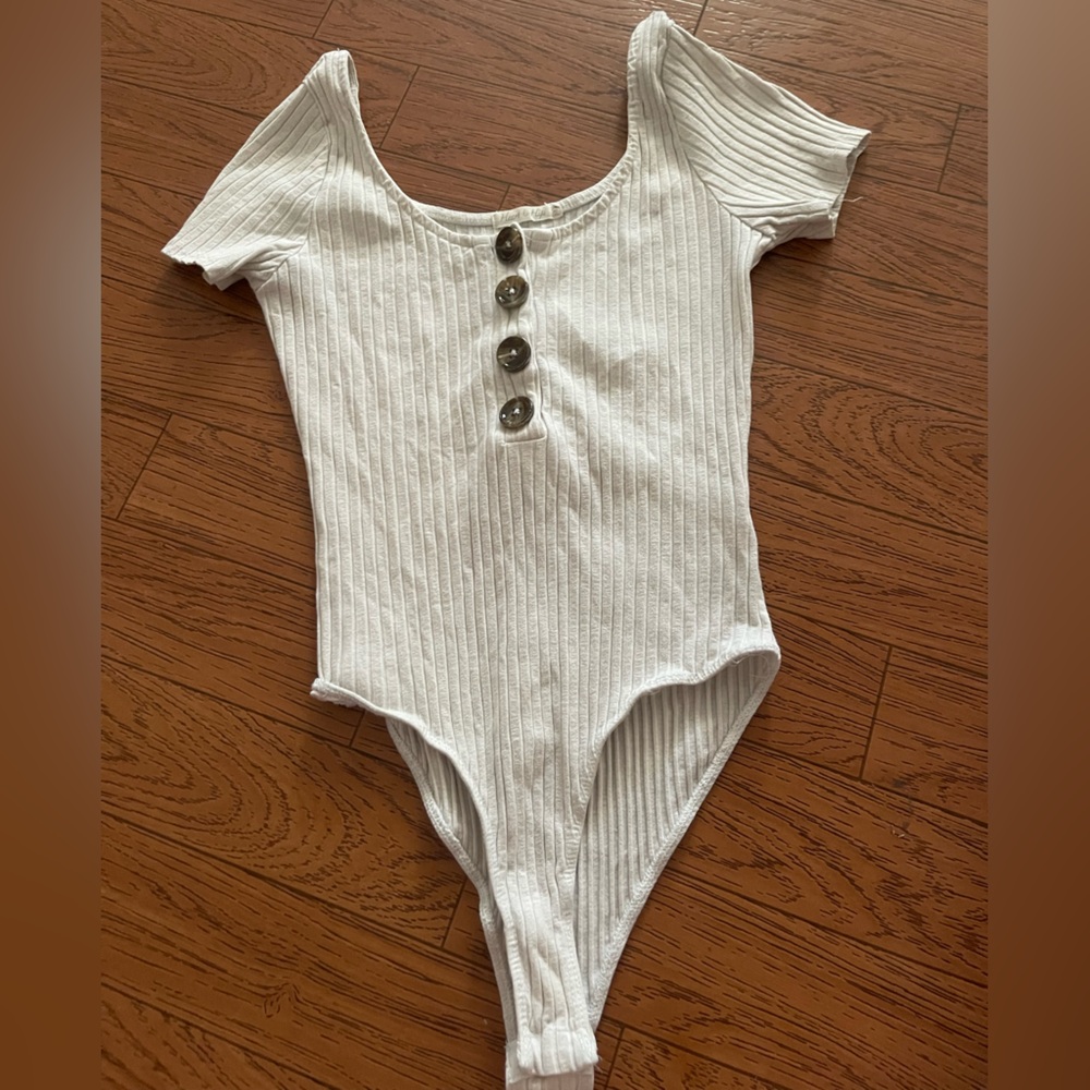 White/cream bodysuit